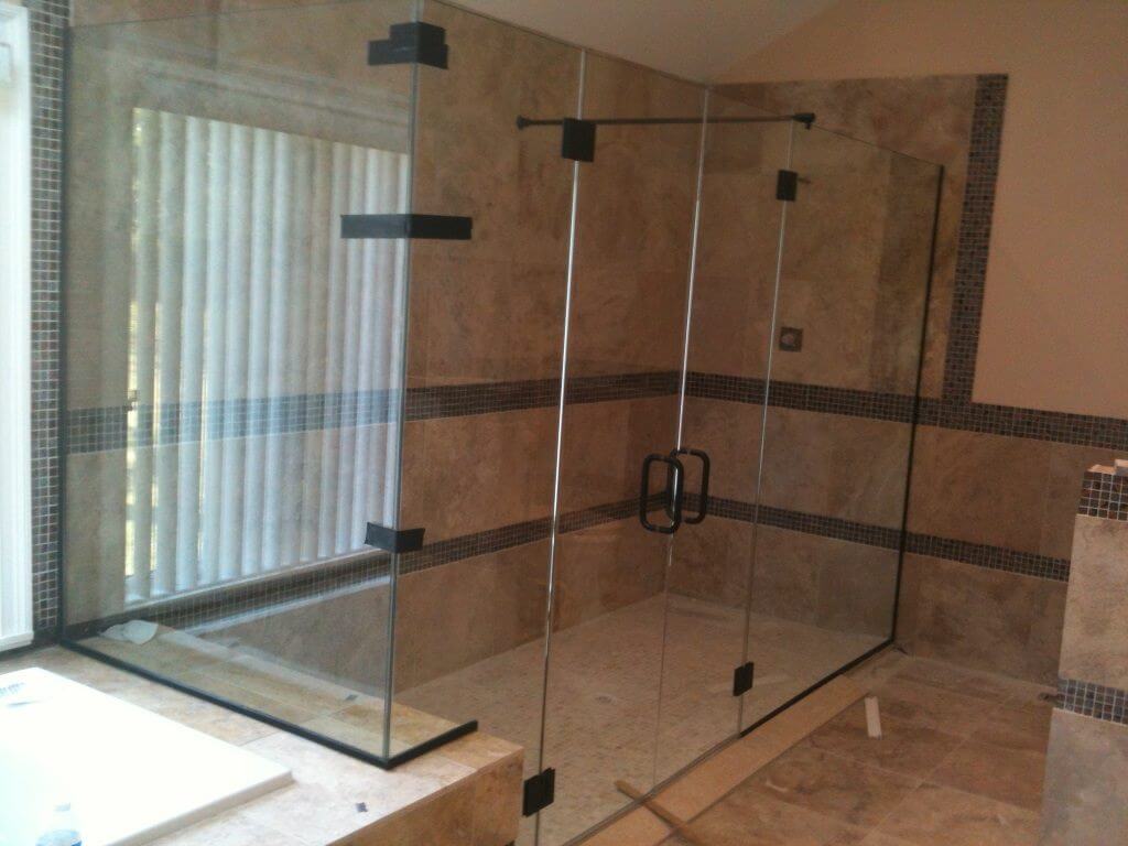 Shower Glass Door. Elegant frameless shower door for modern bathrooms. Customizable glass for a sleek, waterproof shower enclosure.